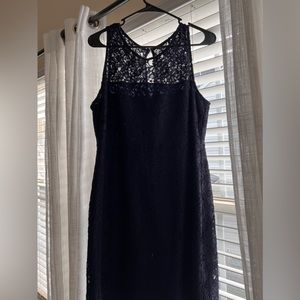 Navy knee length sleeveless dress. Perfect for wedding guest or night event.